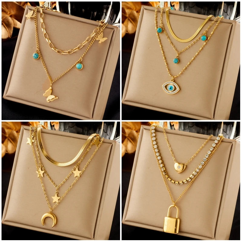 DIEYURO 316L Stainless Steel Butterfly & Moon Pendant Necklace β Blue Eyes Multilayer Choker