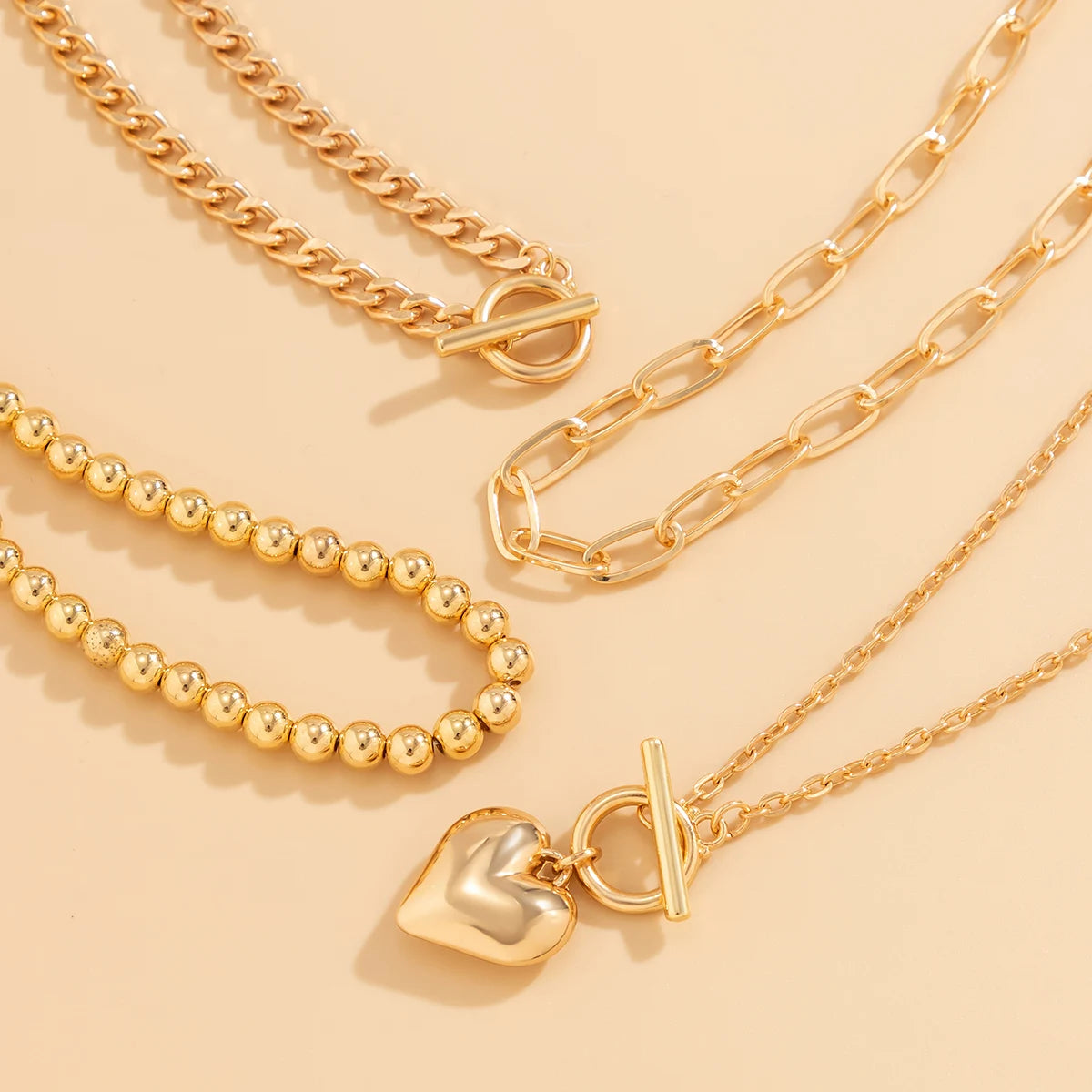 Golden Edge β 4PCS Y2K Heart Pendant Necklace Set