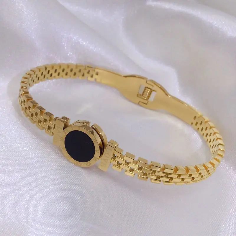 ZAKOL Black Shell Roman Numeral Titanium Steel Bangle β Hollow Circle Button Bracelet