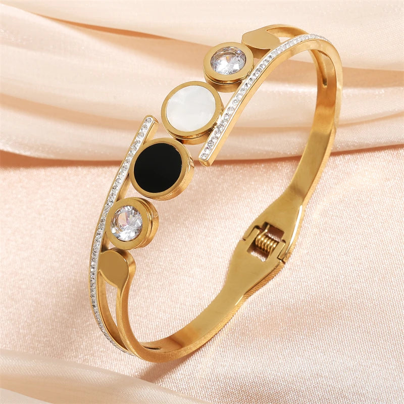 ZAKOL Black Shell Roman Numeral Titanium Steel Bangle β Hollow Circle Button Bracelet