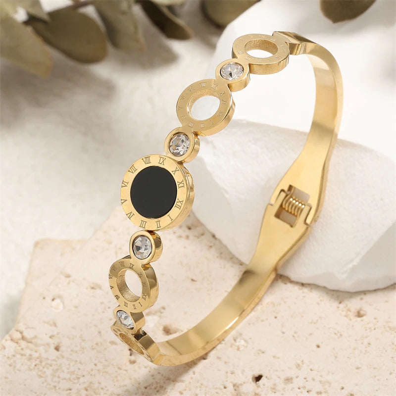 ZAKOL Black Shell Roman Numeral Titanium Steel Bangle β Hollow Circle Button Bracelet