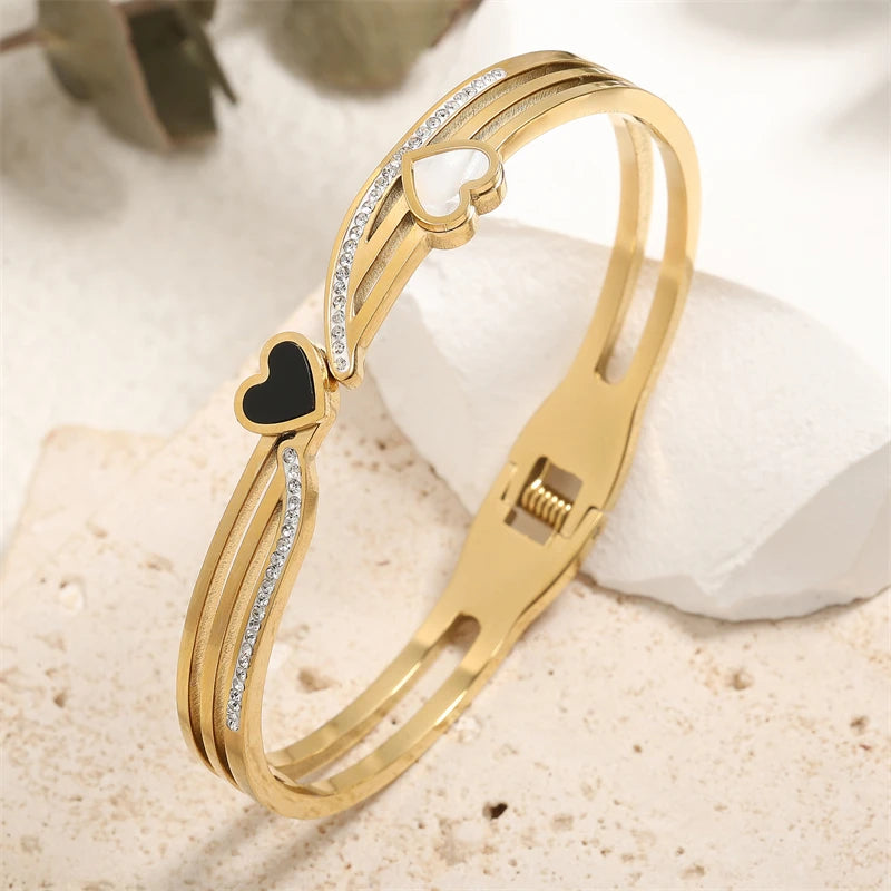 ZAKOL Black Shell Roman Numeral Titanium Steel Bangle β Hollow Circle Button Bracelet