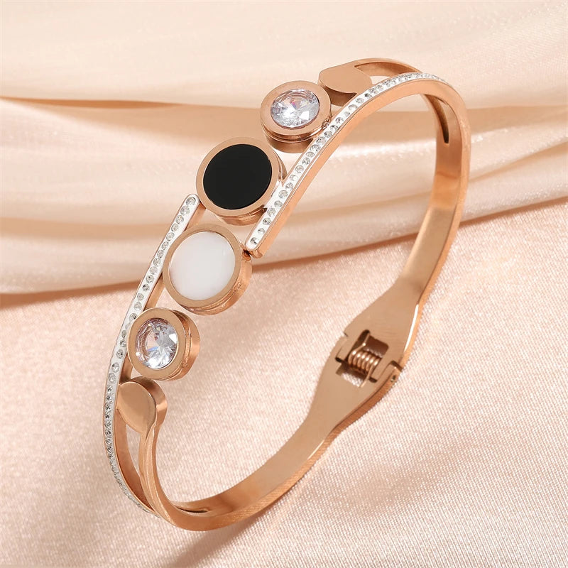 ZAKOL Black Shell Roman Numeral Titanium Steel Bangle β Hollow Circle Button Bracelet