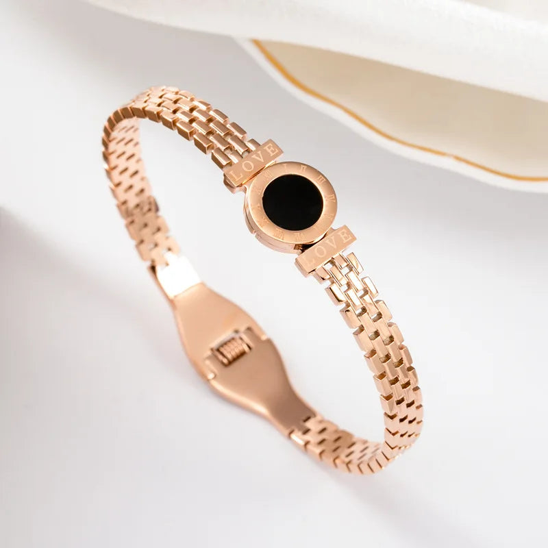 ZAKOL Black Shell Roman Numeral Titanium Steel Bangle β Hollow Circle Button Bracelet