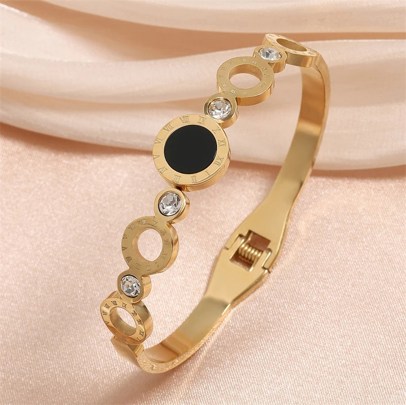 ZAKOL Black Shell Roman Numeral Titanium Steel Bangle β Hollow Circle Button Bracelet
