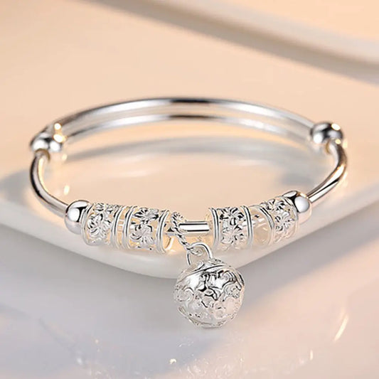 Silver Hollow Bell Bangle Bracelet – Adjustable Fashion Jewelry for Women