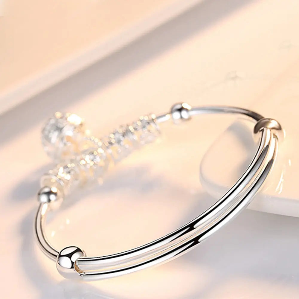 Silver Hollow Bell Bangle Bracelet – Adjustable Fashion Jewelry for Women
